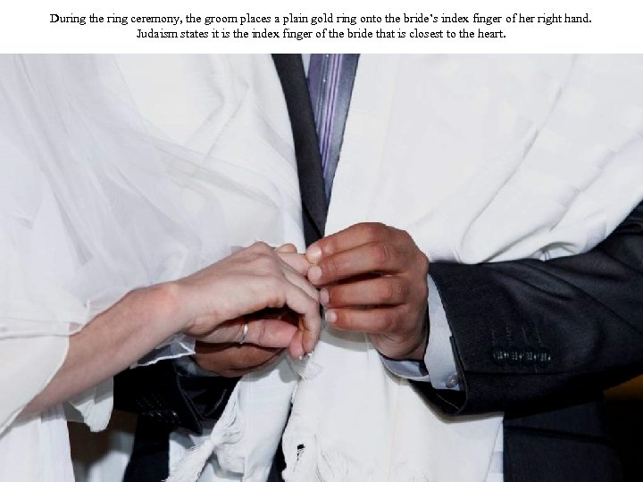 During the ring ceremony, the groom places a plain gold ring onto the bride’s