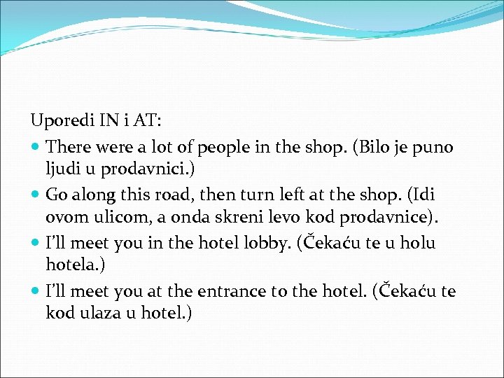 Uporedi IN i AT: There were a lot of people in the shop. (Bilo