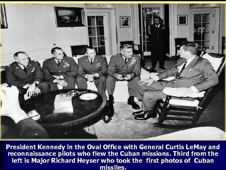 President Kennedy in the Oval Office with General Curtis Le. May and reconnaissance pilots