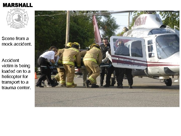 Scene from a mock accident. Accident victim is being loaded on to a helicopter