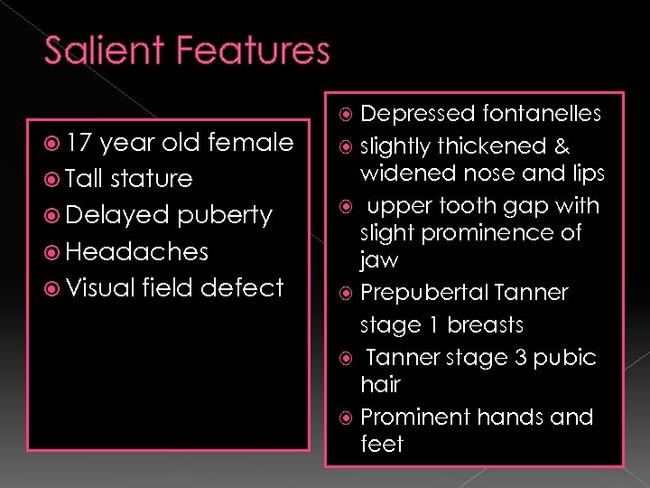 Salient Features Depressed fontanelles slightly thickened & widened nose and lips upper tooth gap