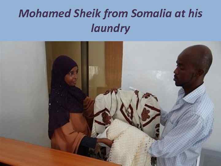 Mohamed Sheik from Somalia at his laundry 