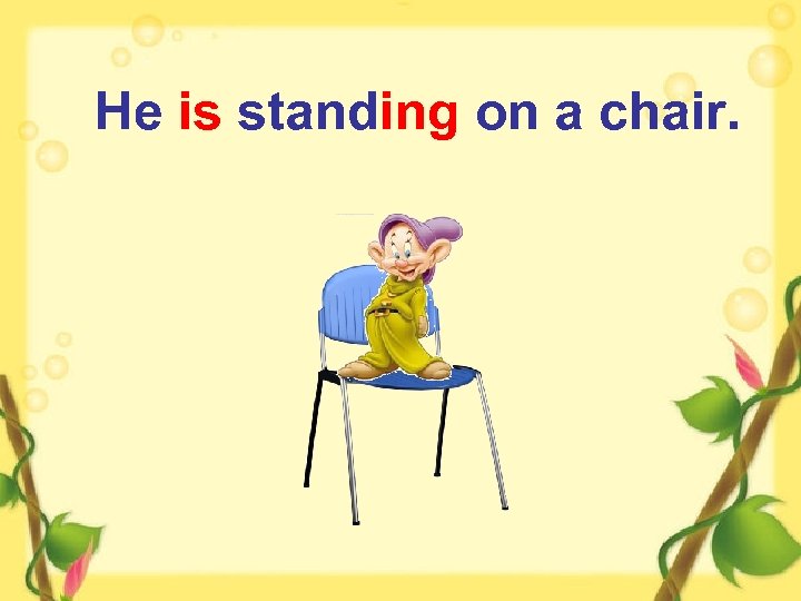 He is standing on a chair. 