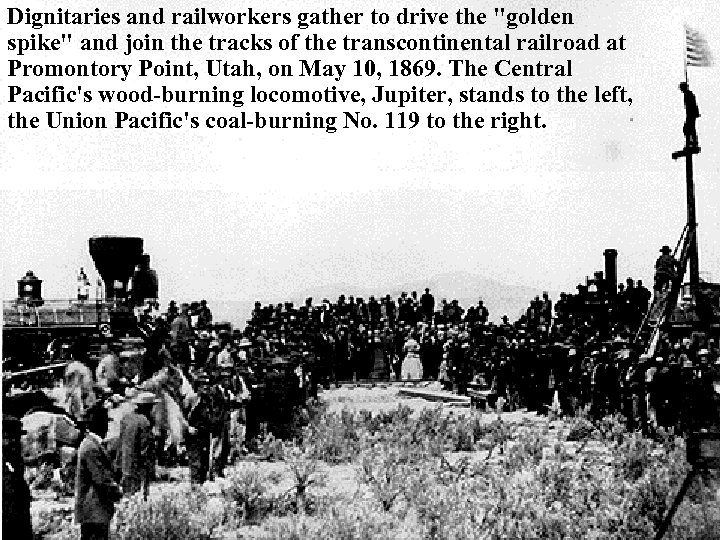 Dignitaries and railworkers gather to drive the "golden spike" and join the tracks of