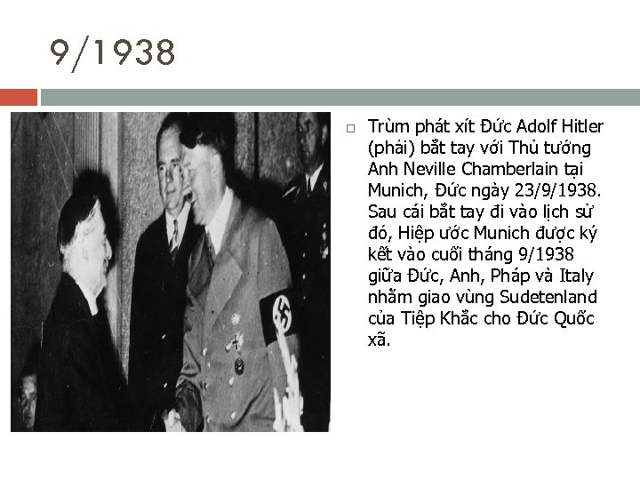 9/1938 Trùm phát xít Đức Adolf Hitler (phải) bắt tay với Thủ tướng Anh