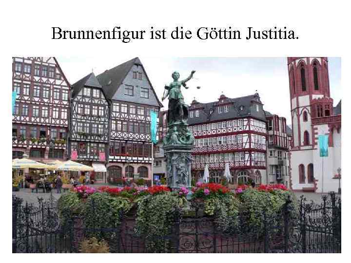 Brunnenfigur ist die Göttin Justitia. 