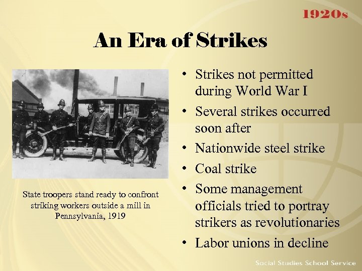 An Era of Strikes State troopers stand ready to confront striking workers outside a