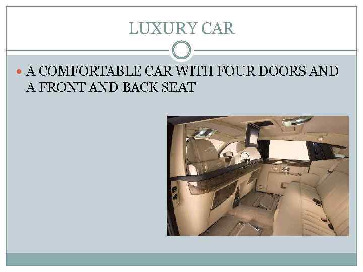 LUXURY CAR A COMFORTABLE CAR WITH FOUR DOORS AND A FRONT AND BACK SEAT