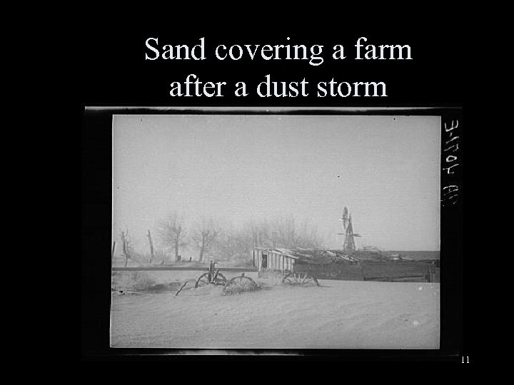 Sand covering a farm after a dust storm 11 