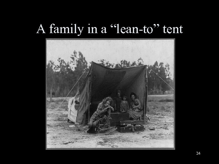 A family in a “lean-to” tent 24 