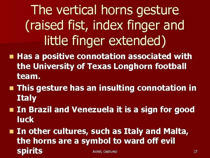 The vertical horns gesture (raised fist, index finger and little finger extended) n n