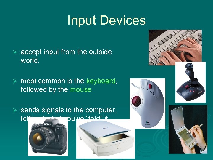 Input Devices Ø accept input from the outside world. Ø most common is the