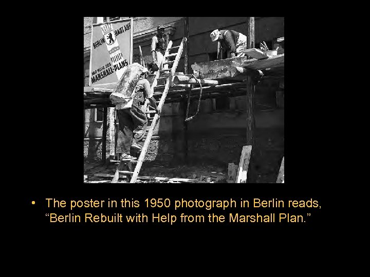  • The Marshall Plan Turns The poster in this 1950 photograph in Berlin