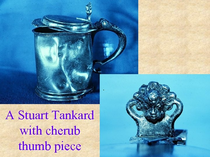 A Stuart Tankard with cherub thumb piece 