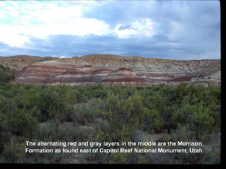 The alternating red and gray layers in the middle are the Morrison Formation as