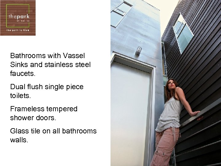 Bathrooms with Vassel Sinks and stainless steel faucets. Dual flush single piece toilets. Frameless