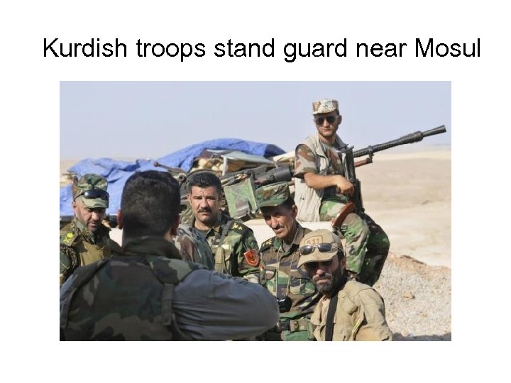 Kurdish troops stand guard near Mosul 