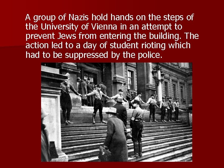  A group of Nazis hold hands on the steps of the University of