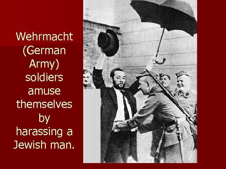 Wehrmacht (German Army) soldiers amuse themselves by harassing a Jewish man. 