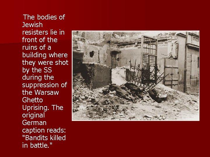  The bodies of Jewish resisters lie in front of the ruins of a