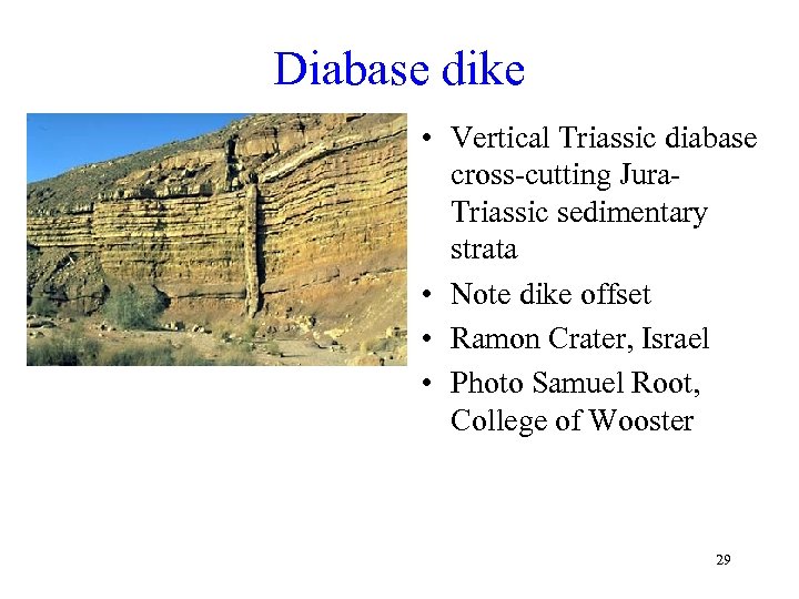 Diabase dike • Vertical Triassic diabase cross-cutting Jura. Triassic sedimentary strata • Note dike