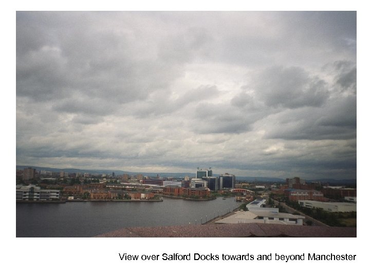 View over Salford Docks towards and beyond Manchester 