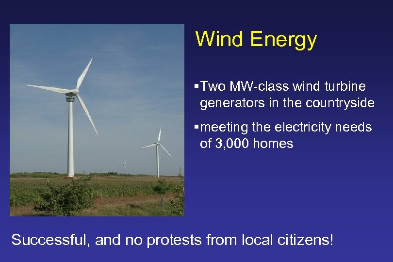 Wind Energy §Two MW-class wind turbine generators in the countryside §meeting the electricity needs