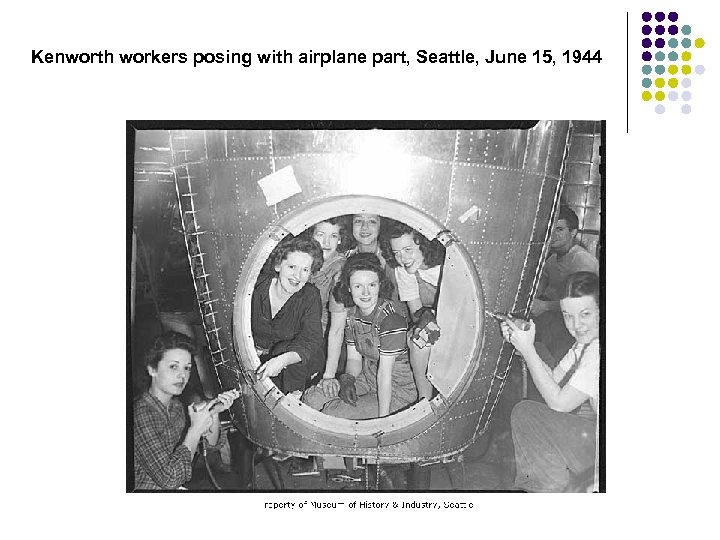 Kenworth workers posing with airplane part, Seattle, June 15, 1944 