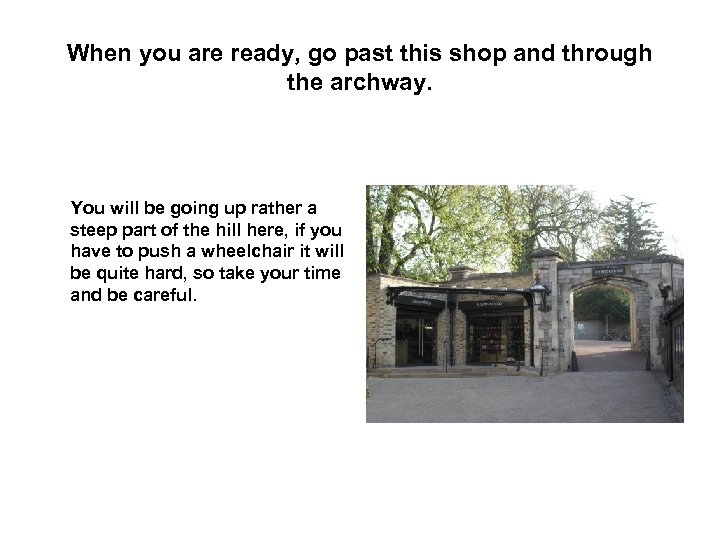 When you are ready, go past this shop and through the archway. You will