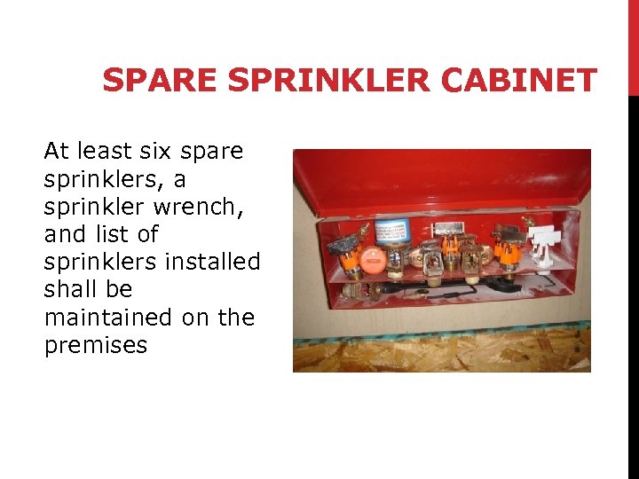 SPARE SPRINKLER CABINET At least six spare sprinklers, a sprinkler wrench, and list of