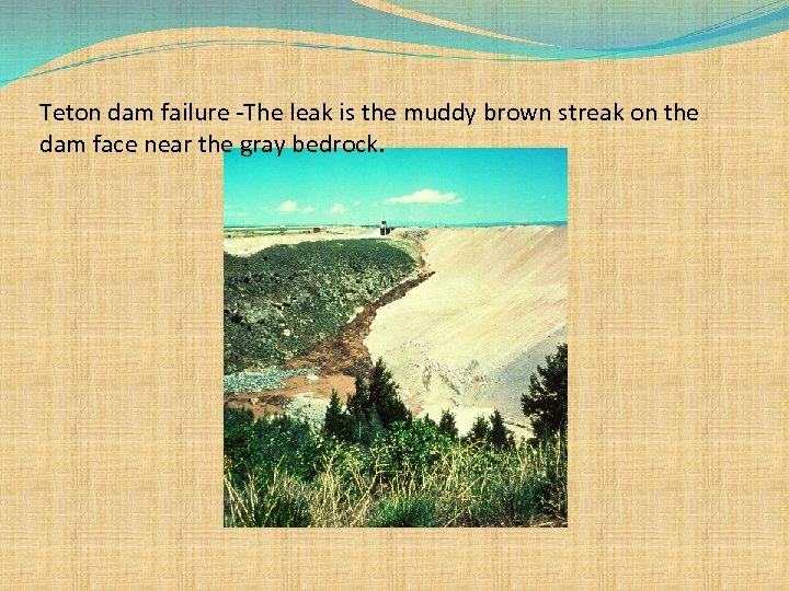 Teton dam failure -The leak is the muddy brown streak on the dam face