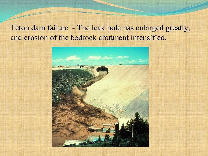 Teton dam failure - The leak hole has enlarged greatly, and erosion of the