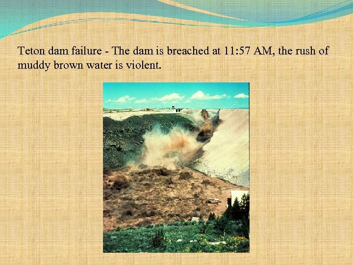 Teton dam failure - The dam is breached at 11: 57 AM, the rush