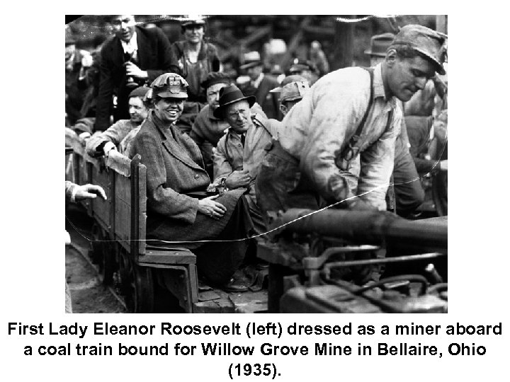 First Lady Eleanor Roosevelt (left) dressed as a miner aboard a coal train bound