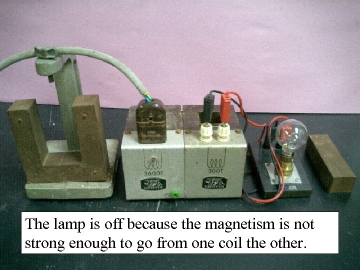 The lamp is off because the magnetism is not strong enough to go from