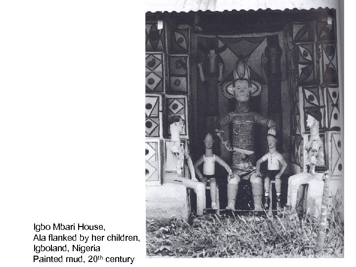 Igbo Mbari House, Ala flanked by her children, Igboland, Nigeria Painted mud, 20 th