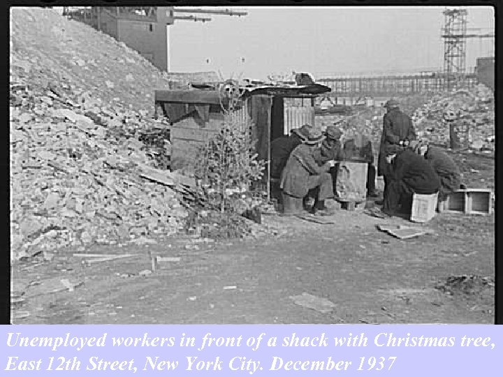 Unemployed workers in front of a shack with Christmas tree, East 12 th Street,