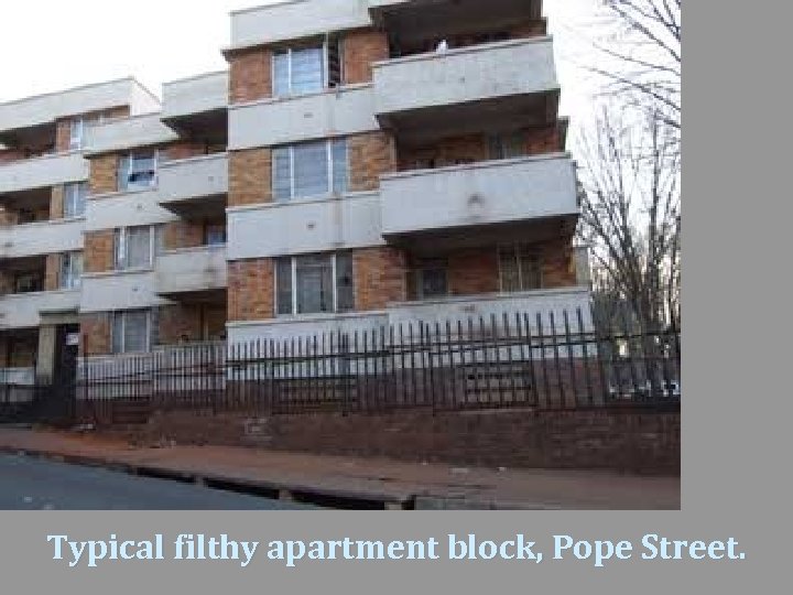 Typical filthy apartment block, Pope Street. 