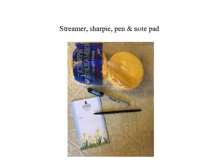 Streamer, sharpie, pen & note pad 