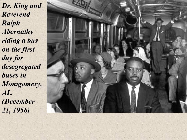 Dr. King and Reverend Ralph Abernathy riding a bus on the first day for