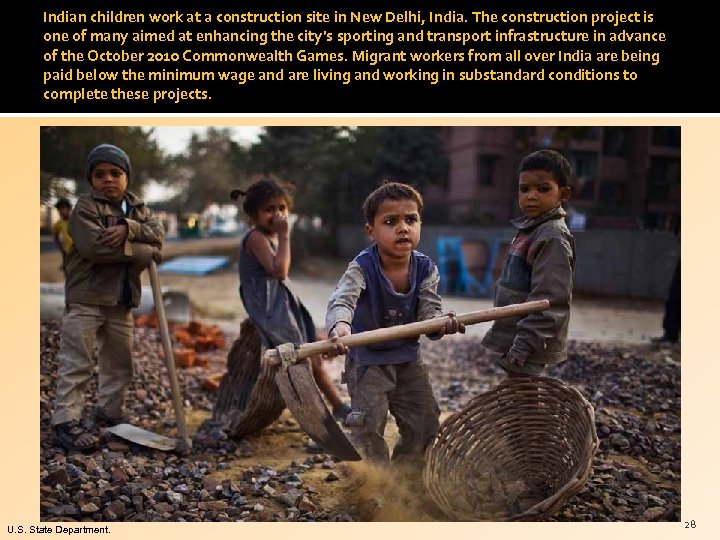 Indian children work at a construction site in New Delhi, India. The construction project