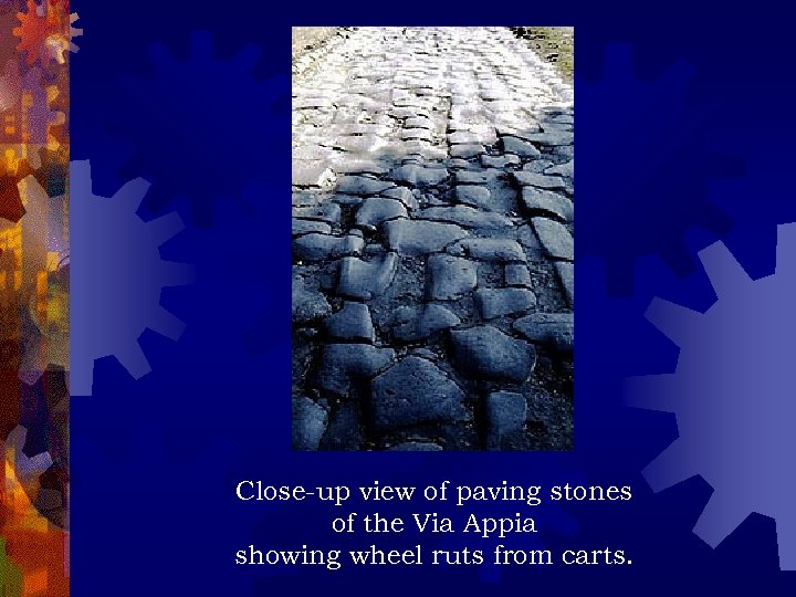 Close-up view of paving stones of the Via Appia showing wheel ruts from carts.