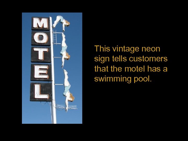 This vintage neon sign tells customers that the motel has a swimming pool. 