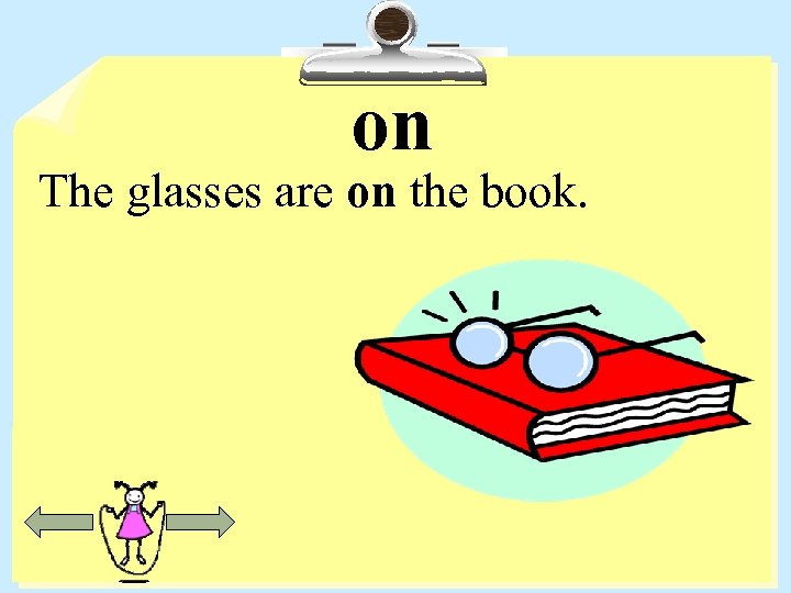 on The glasses are on the book. 