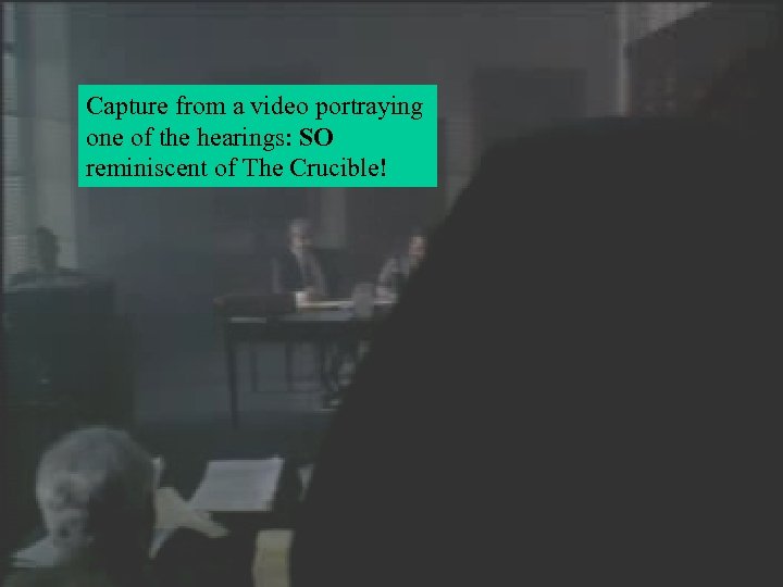 Capture from a video portraying one of the hearings: SO reminiscent of The Crucible!