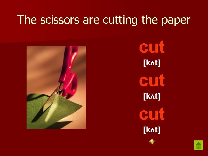 The scissors are cutting the paper cut [kʌt] 