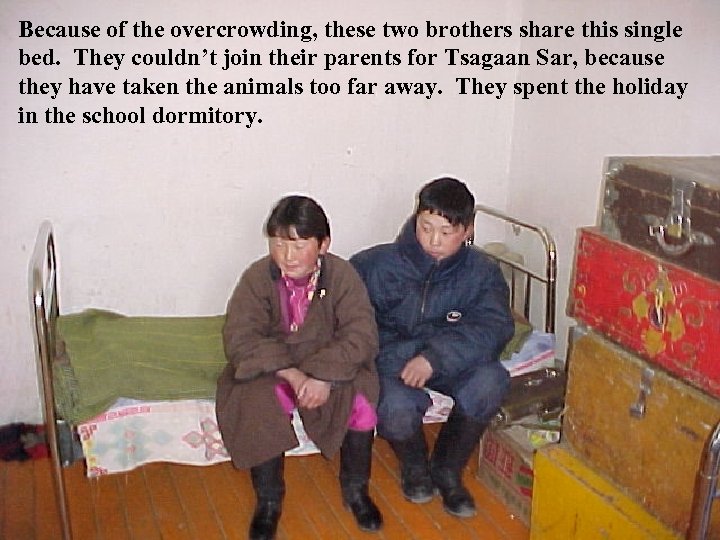 Because of the overcrowding, these two brothers share this single bed. They couldn’t join