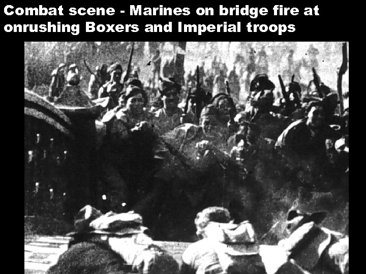Combat scene - Marines on bridge fire at onrushing Boxers and Imperial troops 