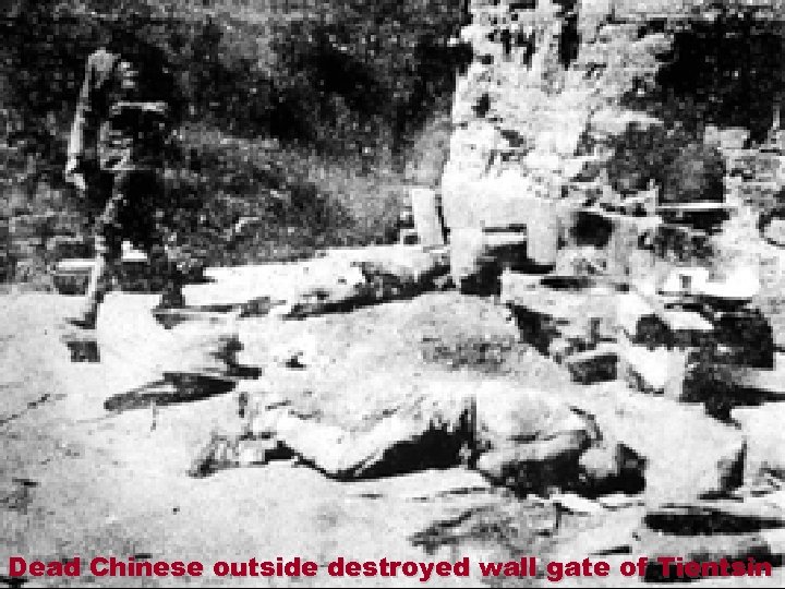Dead Chinese outside destroyed wall gate of Tientsin 