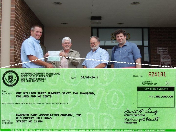 Harford County, MD agricultural preservation program administrator presents Rural Legacy check for $1, 326,